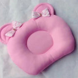 Pink baby head shaping pillow