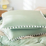 Plain Dyed Duvet with pom pom lace - The Linen House