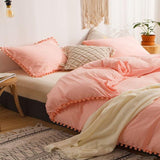 Plain Dyed Duvet with pom pom lace - The Linen House