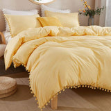 Plain Dyed Duvet with pom pom lace - The Linen House