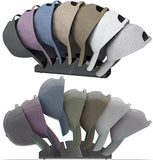 Set of baseball caps in various colors displayed on a stand.