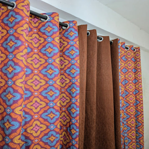 Curtains with colorful geometric pattern and plain brown section