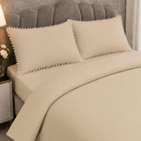 Beige Duvet Cover Set with White Pom Pom Lace Pillowcases - The Linen House