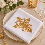 Elegant White Cotton Napkins with Gold Floral Embroidery - The Linen House