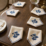 Luxury Embroidered Table Runner – White with Blue Floral Detailing - The Linen House