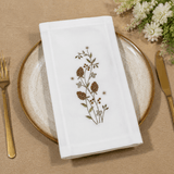 Nature-Inspired Table Linen – White Base with Brown Botanical Design - The Linen House